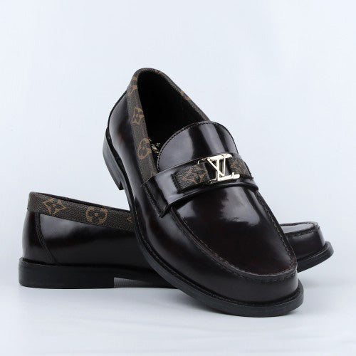 Black Shoes with Patterned Strap and Silver Buckle