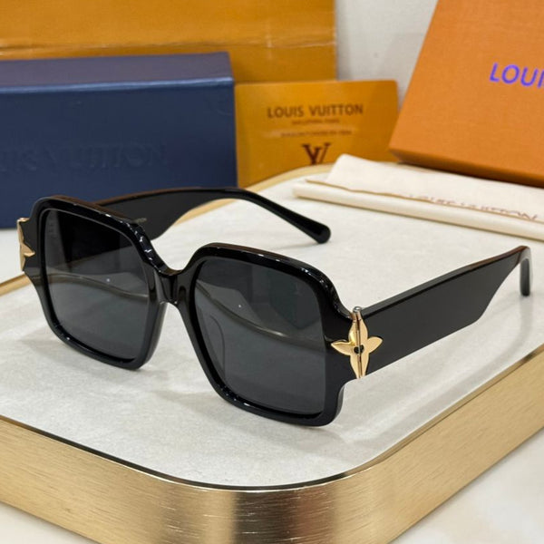 Louis Vuitton sunglasses with packaging on a white surface