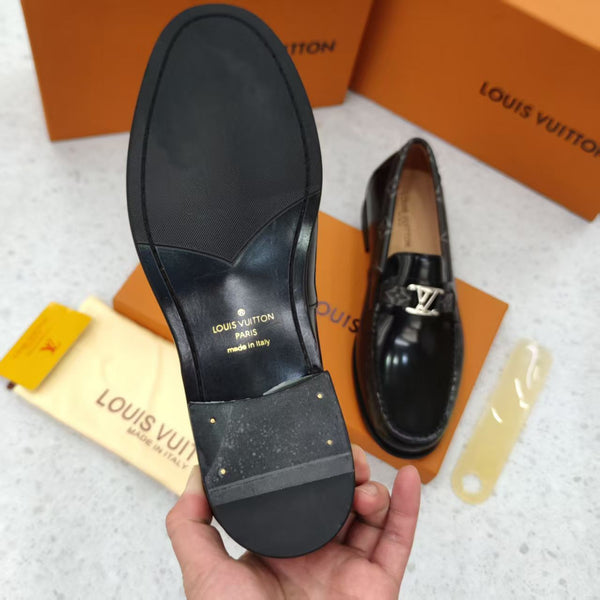 Black Shoes with Patterned Strap and Silver Buckle