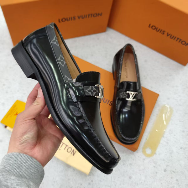 Black Shoes with Patterned Strap and Silver Buckle