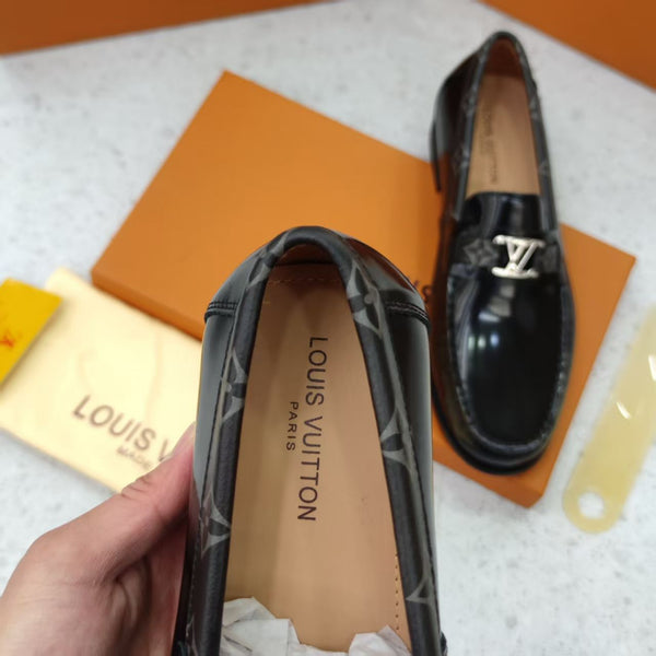 Black Shoes with Patterned Strap and Silver Buckle