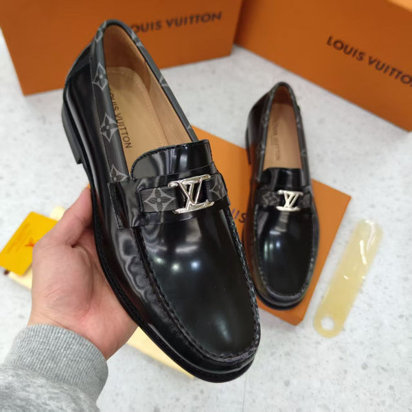 Black Shoes with Patterned Strap and Silver Buckle