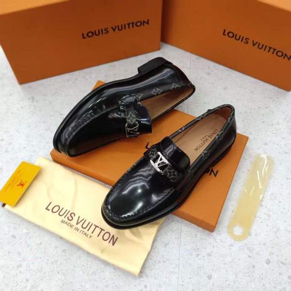 Black Shoes with Patterned Strap and Silver Buckle