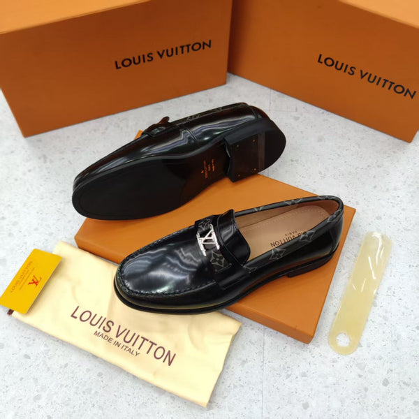 Black Shoes with Patterned Strap and Silver Buckle