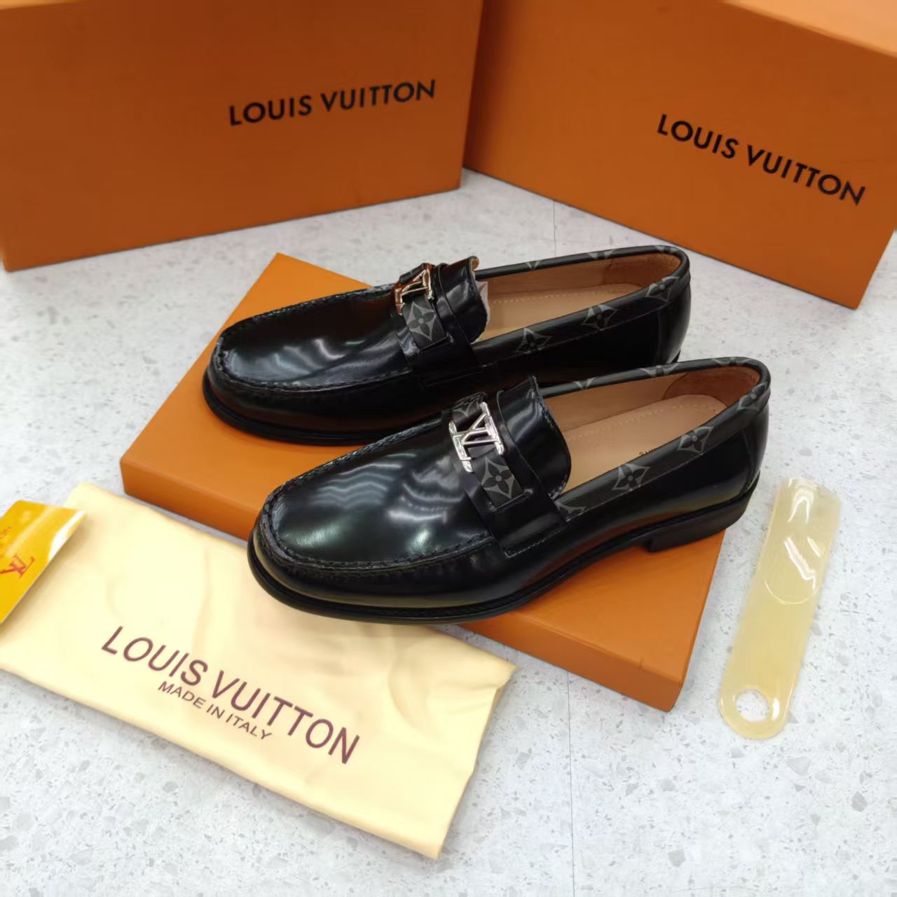 Black Shoes with Patterned Strap and Silver Buckle