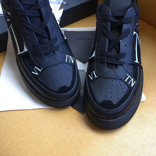 Men Premium All-Black Low-Top Street Sneakers – Bold Monogram Design