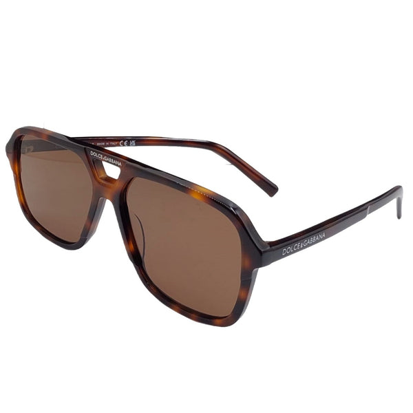 Sunglasses with tortoiseshell frame and brown lenses on a white background