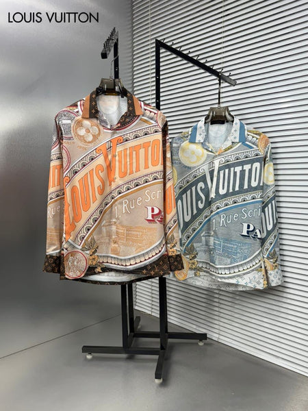 Premium brand men's long sleeve shirts in orange and blue colorways featuring 1 Rue Scribe Paris heritage graphic print with LV monogram pattern on display stands