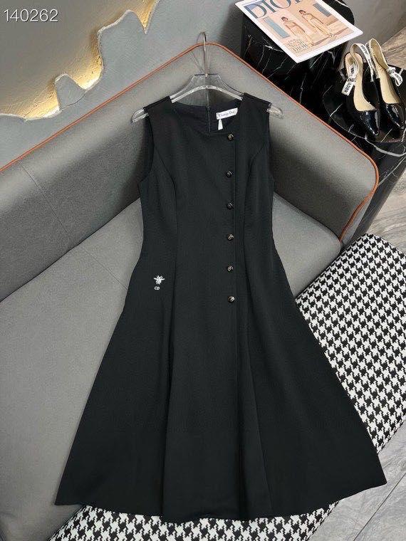 Elegant Sleeveless Black A-Line Dress with Asymmetrical Button Detailing