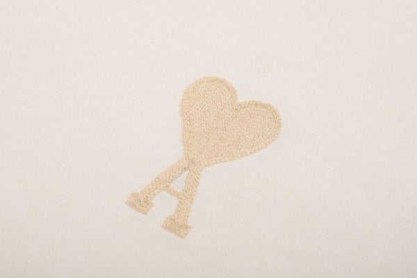 Luxurious Oversized Cream T-shirt With Heart Logo