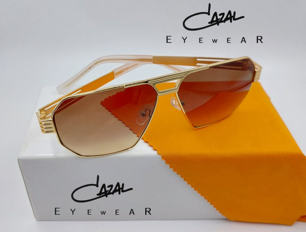 Luxury Gold Frame Sunglasses – Iconic Design with Gradient Amber Lenses