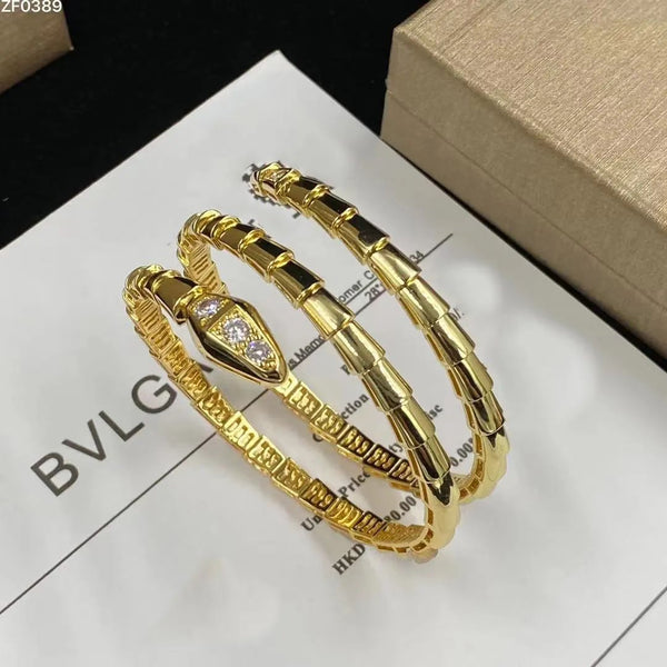 Elegant Gold Serpent Wrap Bracelet  Luxury Snake Head Design