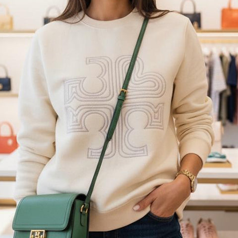 Elegant Beige Sweatshirt with Embossed Design