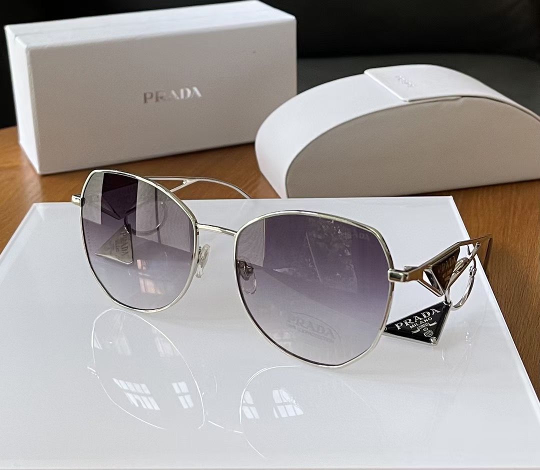 Buy Prada Unisex Oval Sunglasses PS05RS 58 UB05X1 - Sunglasses for Unisex  1494057 | Myntra